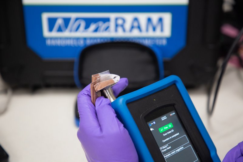 Analyzing grape seed extract with 1064 nm laser with point and shoot adapter.