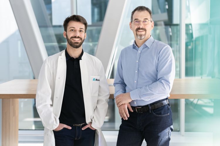 smiling male lab workers