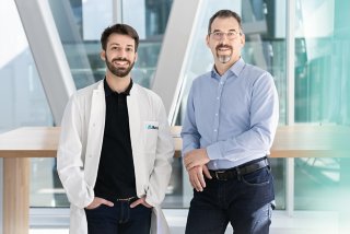 smiling male lab workers