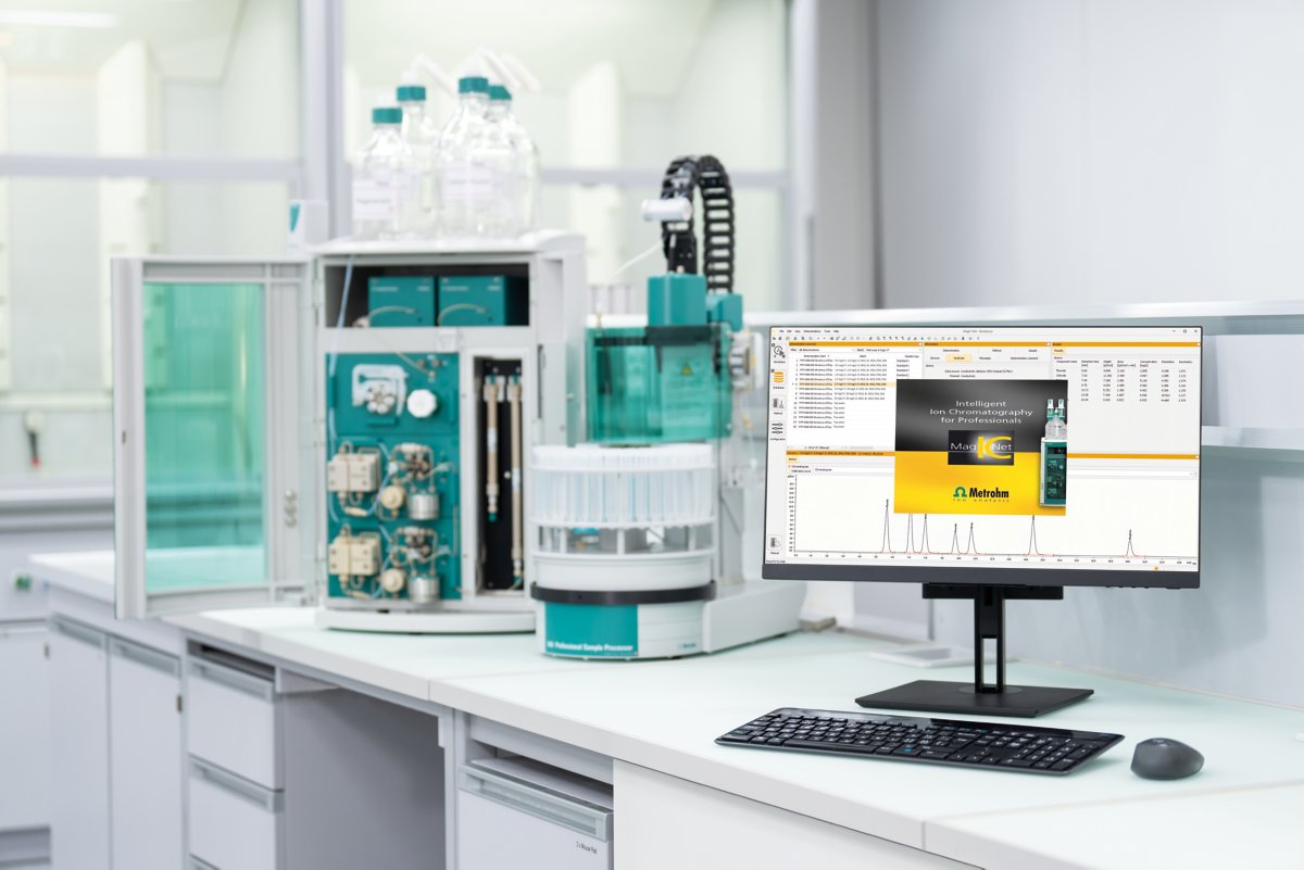 MagIC Net ion chromatography software, ion chromatography system in the background, computer with desktop showing MagIC net at the front