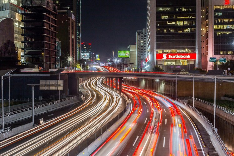 Long exposure photograph of cars traveling at night.